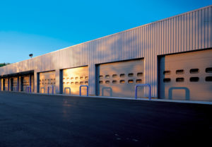 Garage doors on a commercial warehouse building.
