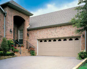Brick house with beige garage door